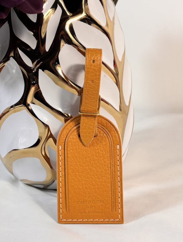 Louis Vuitton Pebbled Luggage tag