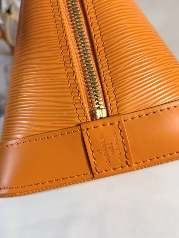Louis Vuitton Alma Epi Orange - Image 9