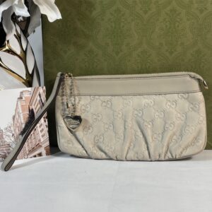 Gucci Cream Guccissima Leather Heart Wristlet Pochette Bag