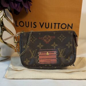 Louis Vuitton Trunks and Locks Mini Pochette Accessories